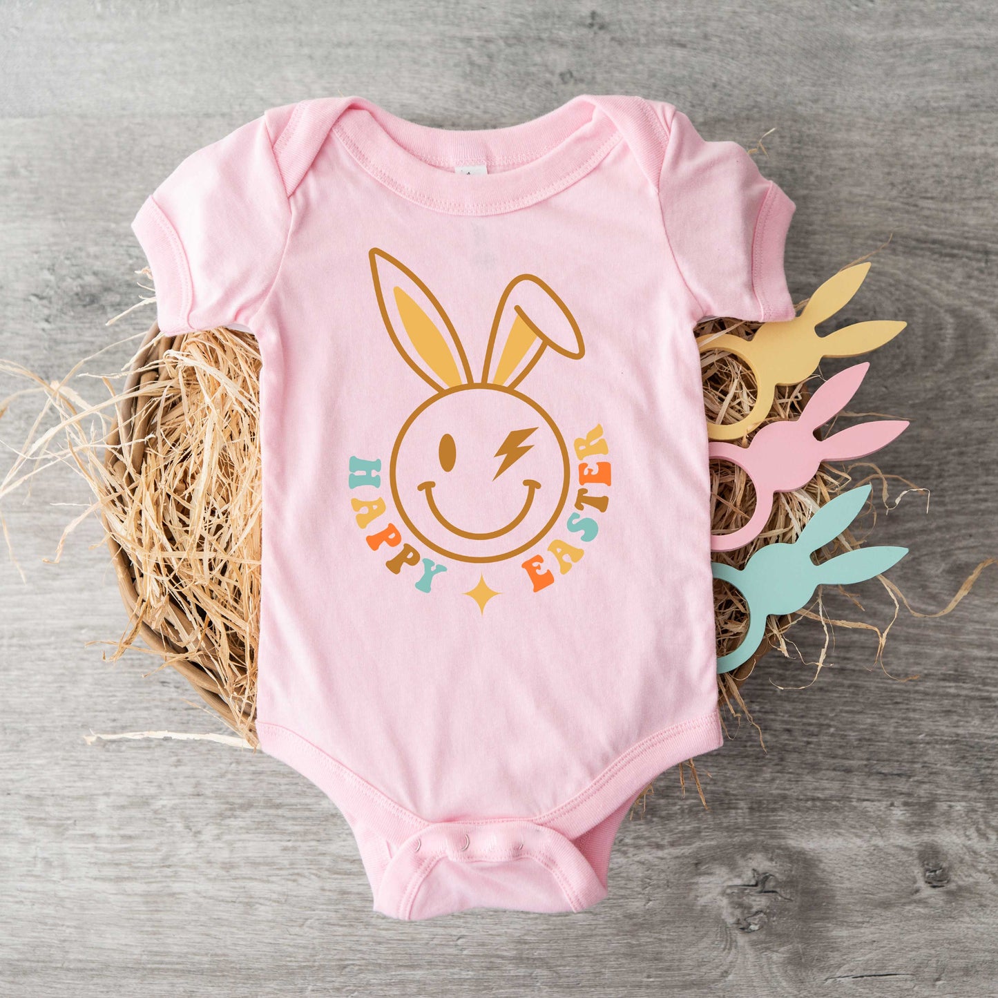 Happy Easter Smiley Lightning Bolt | Baby Graphic Short Sleeve Onesie