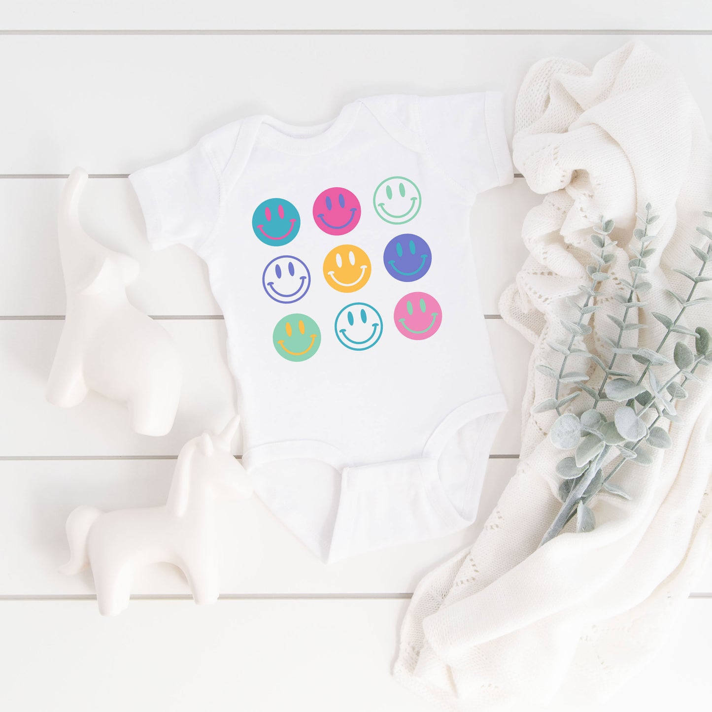 Stacked Smiley Faces | Baby Graphic Short Sleeve Onesie