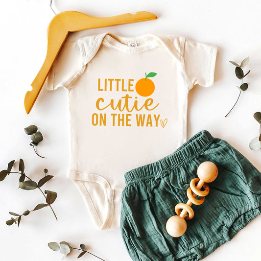 Little Cutie On The Way Orange | Baby Graphic Short Sleeve Onesie