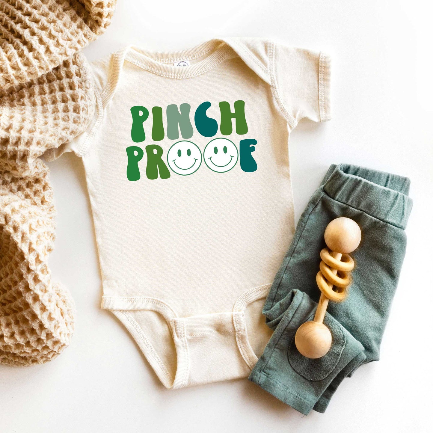 Pinch Proof Smiley Face | Baby Graphic Short Sleeve Onesie