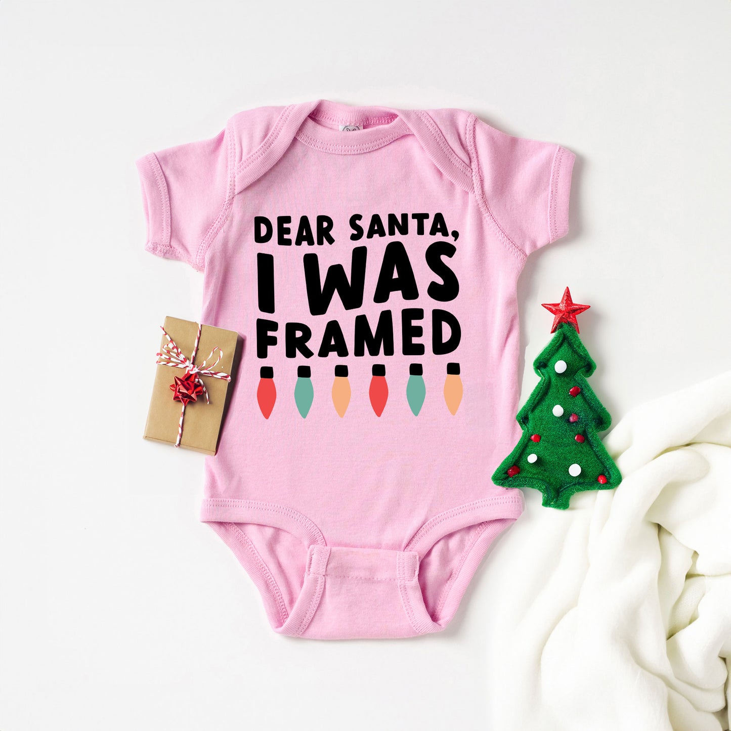 I Was Framed Lights | Baby Graphic Short Sleeve Onesie