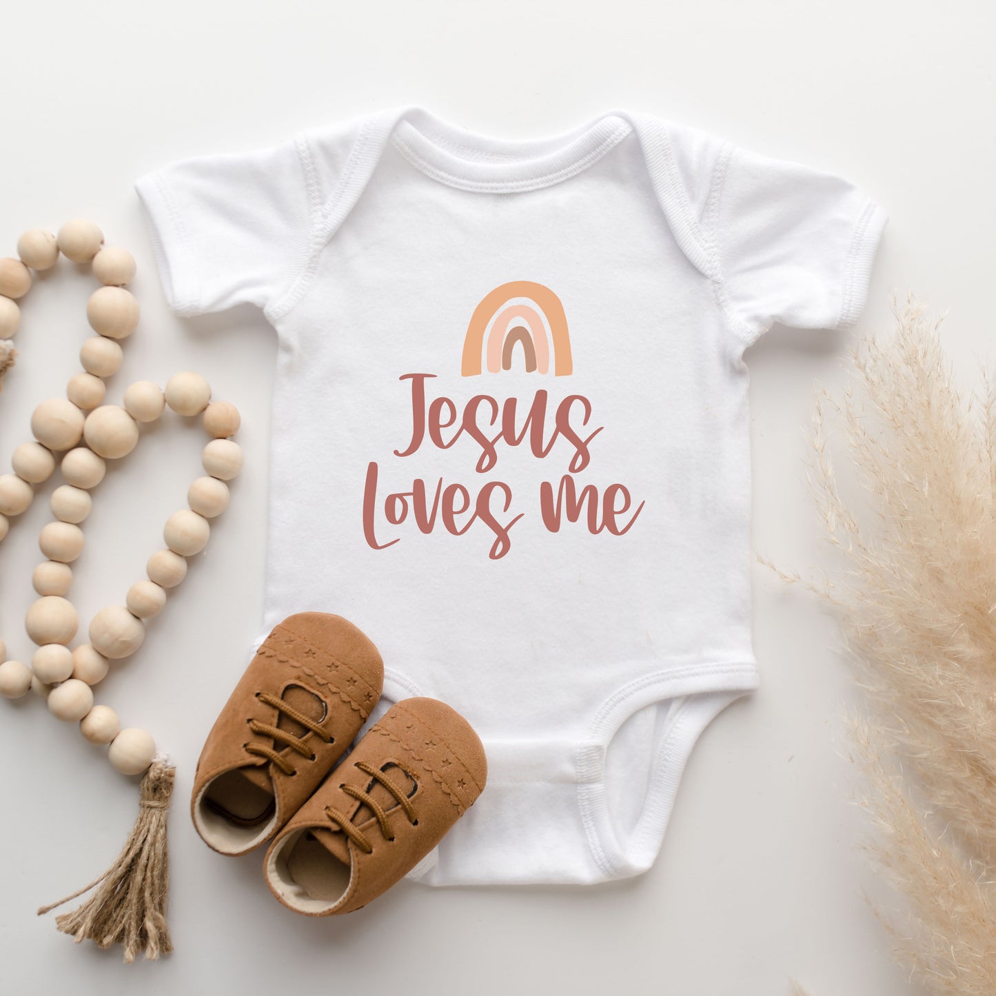 Jesus Loves Me Rainbow | Baby Graphic Short Sleeve Onesie